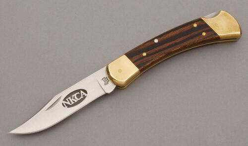Buck Knives 2001 NKCA 110 Lockback with Wood Micarta Handle Scales handle material - Obverse Side - Item #KLC09559