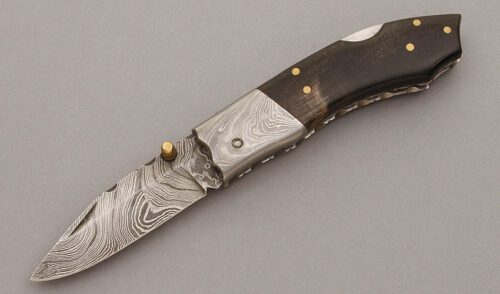 Unknown Maker Lockback Folder with Buffalo Horn Scales handle material - Obverse Side - Item #KLC09670