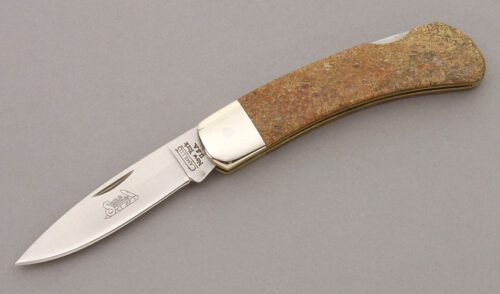 Camillus Cutlery 864 Small Lockback with Brontosaurus Bone Scales handle material - Obverse Side - Item #KLC09678