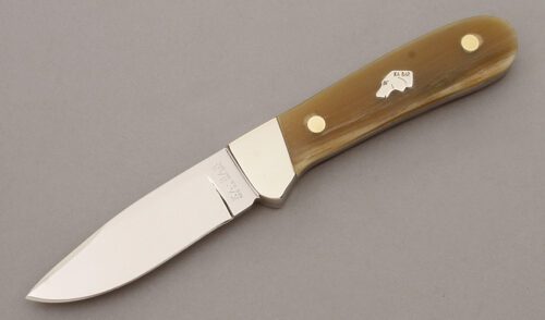 Ka-Bar Knives Trailing Point Hunter with Rams Horn Scales handle material - Obverse Side - Item #KLC09698