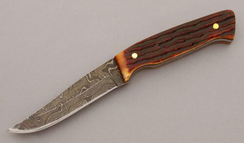 Jim Thompson Birdknife with Jigged Amber Bone Scales handle material - Obverse Side - Item #KLC09730