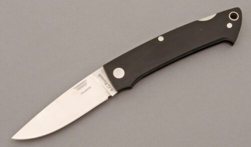 A.G. Russell Gents Lockback Folder with Black Micarta Handles handle material - Obverse Side - Item #KLC09756