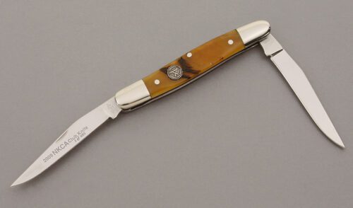 Canal Street Cutlery 2009 NKCA Club Muskrat Folder with Smooth Oiled Rams Horn handle material - Obverse Side - Item #KLC09787