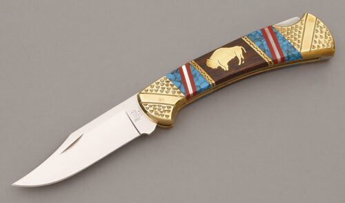 Buck/Yellowhorse Knives 110 Custom Lockback with Brass Frame handle material - Obverse Side - Item #KLC09838