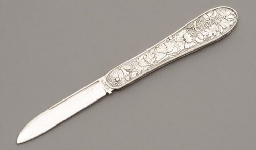M.B. Co. Ladies Fruit Knife with Embossed Silver Frame handle material - Obverse Side - Item #KLC09872