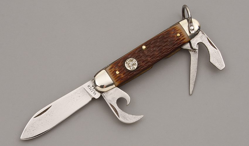 Ulster Knives Boy Scout Knife with Jigged Delrin Scales handle material - Obverse Side - Item #KLC09877