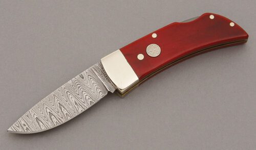 Boker Knives Small Damascus Lockback with Smooth Red Bone Scales handle material - Obverse Side - Item #KLC09992