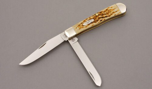 Case Cutlery 6254 Pocket Worn Trapper with Antique Jigged Bone Scales handle material - Obverse Side - Item #KLC10016