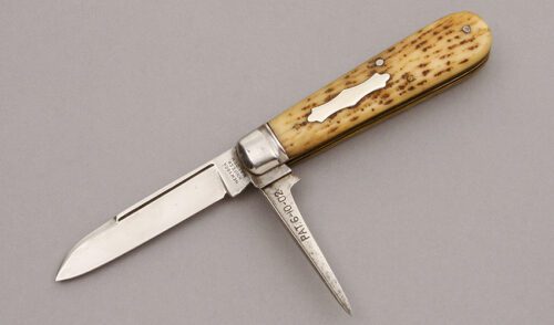 New York Knife Co. Two Blade Harness Knife with Jigged Bone Scales handle material - Obverse Side - Item #KLC10073