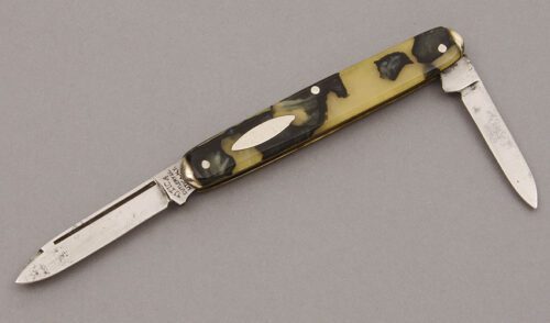 Utica Cutlery Co. Two Blade Pen Knife with Black & Yellow Celluloid handle material - Obverse Side - Item #KLC10079