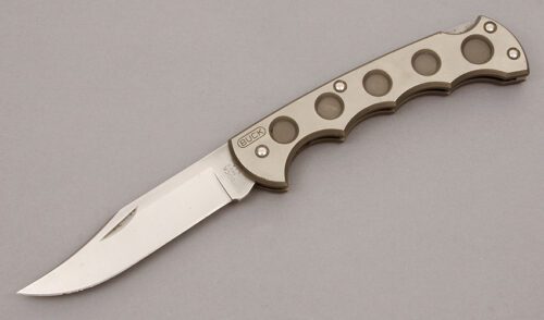 Buck Knives Model 560 Titanium Lockback with Titanium Handle Scales handle material - Obverse Side - Item #KLC10121