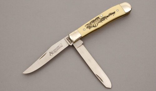 Schrade Cutlery 296 Scrimshaw Trapper with Ivory Delrin Handles handle material - Obverse Side - Item #KLC10133