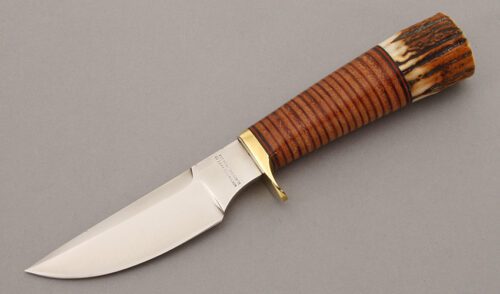 Northwoods Knives Skinner with Stacked Leather & Stag Handle handle material - Obverse Side - Item #KLC10250