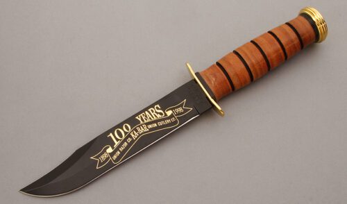 Ka-Bar Knives 100 Years Anniversary Fighter with Stacked Leather Handle handle material - Obverse Side - Item #KLC10322