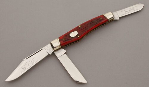 Schatt & Morgan 043150 Stockman with Red Jigged Bone Scales handle material - Obverse Side - Item #KLC10362