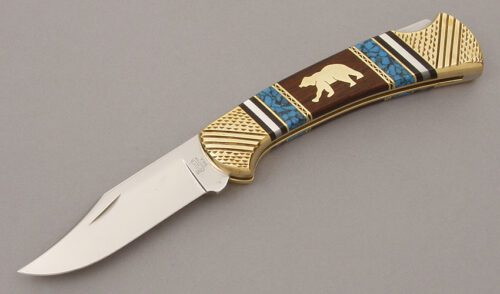 Buck/Yellowhorse 112 Grizzly Bear Lockback with Brass Frame handle material - Obverse Side - Item #KLC10371