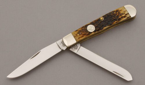 Case Cutlery 6254 Ducks Unlimited Trapper with Antique Jigged Bone Scales handle material - Obverse Side - Item #KLC10416