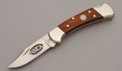 Buck Knives NKCA 2007 Club Lockback Knife with Wood Handle Scales handle material - Obverse Side - Item #KLC10477