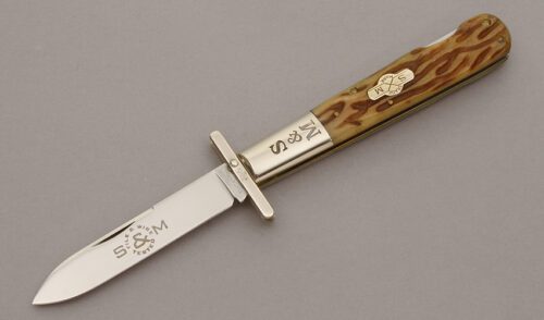 Schatt & Morgan 04121L Swing Guard Lockback with Moss Green Jigged Bone Scales handle material - Obverse Side - Item #KLC10626