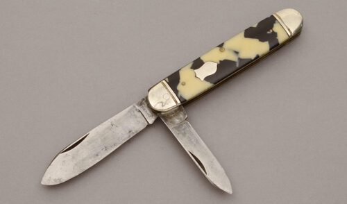 Imperial Knife Co. Two Blade Jack Knife with Black & Yellow Celluloid handle material - Obverse Side - Item #KLC10650