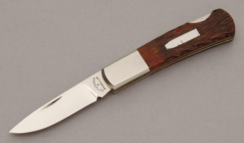 Cattaraugus Cutlery KCC CM-11 Lockback with Brown Jigged Bone Scales handle material - Obverse Side - Item #KLC10665