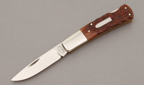 Cattaraugus Cutlery KCC CM-10 Barlow Lockback with Brown Jigged Bone Scales handle material - Obverse Side - Item #KLC10666