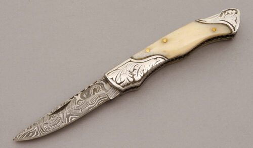 Unknown Maker Damascus Lockback with Stainless Steel Frame handle material - Obverse Side - Item #KLC10674