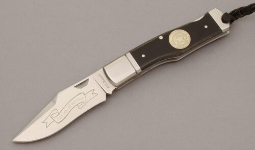 A.G. Russell 2008 Texas Ranger Lockback with Black Micarta Handle Scales handle material - Obverse Side - Item #KLC10690