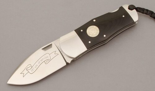 A.G. Russell 2010 Texas Ranger Lockback with Ebony Rucarta Scales handle material - Obverse Side - Item #KLC10692