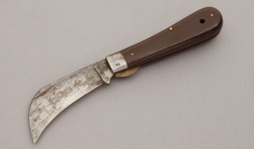 Camillus Cutlery Hawkbill with Bakelite Handle Scales handle material - Obverse Side - Item #KLC10738