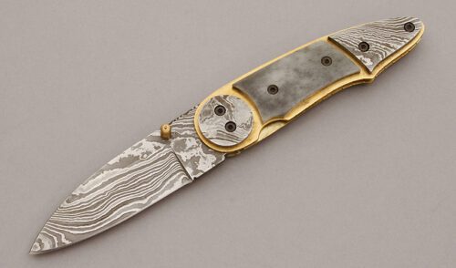 Unknown Maker Damascus Linerlock Folder with N/A handle material - Obverse Side - Item #KLC10861