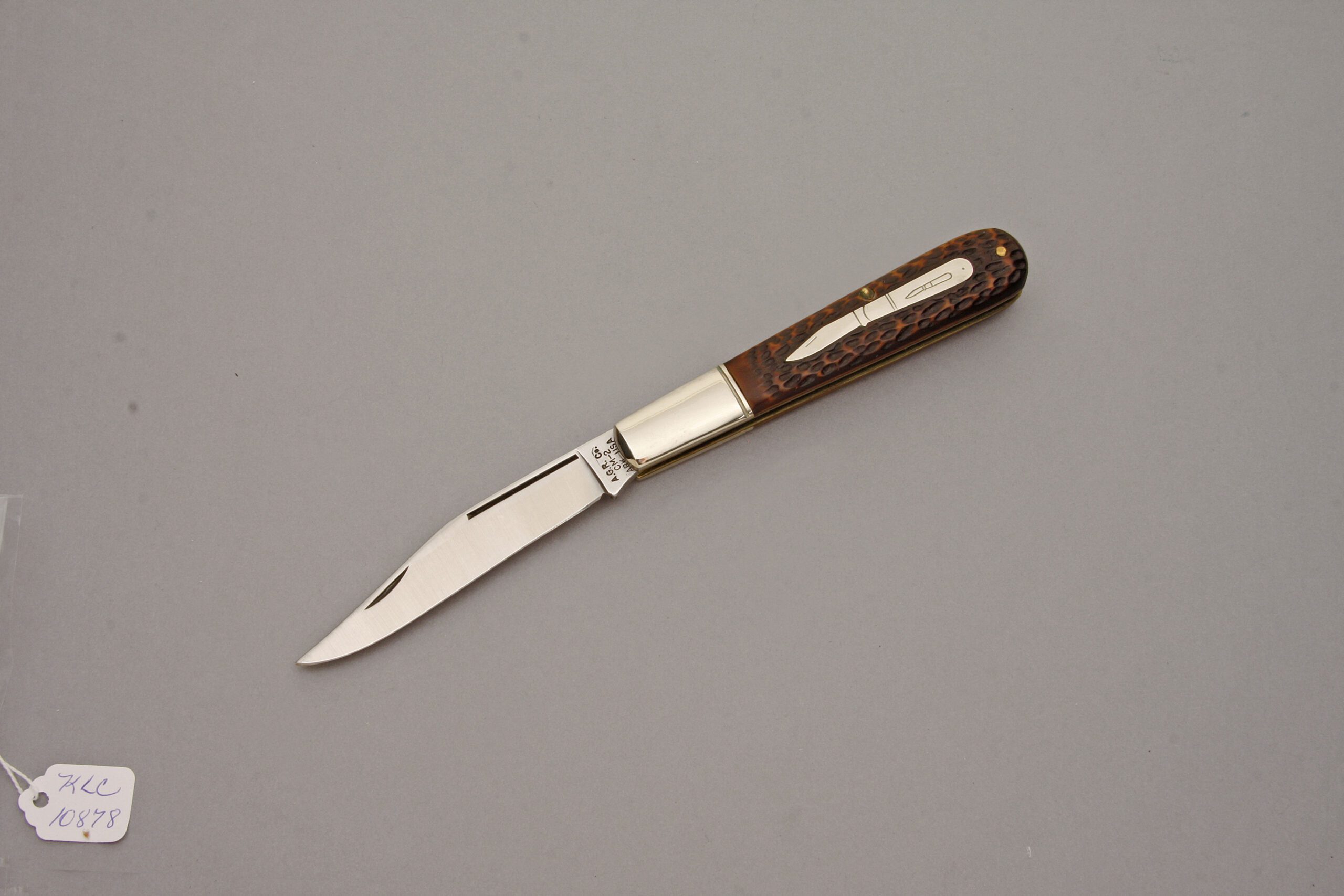 A.G. Russell CM-2 Grandaddy Barlow with Jigged Delrin Handle Scales handle material - Obverse Side - Item #KLC10878