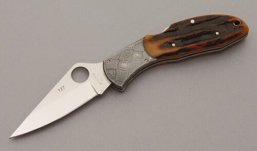 Spyderco Knives 25th Anniversary Delica with Honey Jigged Bone Scales handle material - Obverse Side - Item #KLC10886