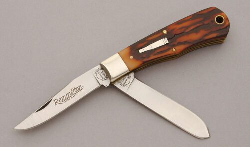 Remington Knives R1178 Mini Bullet Trapper with Jigged Delrin Scales handle material - Obverse Side - Item #KLC10887