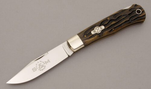 Schatt & Morgan 04113L Mountain Man Lockback with Golden Root Worm Groove Bone handle material - Obverse Side - Item #KLC10900