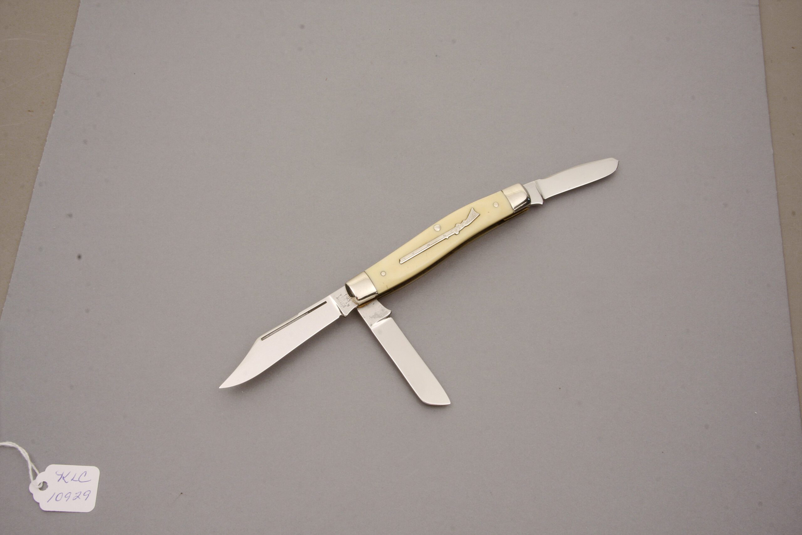 Schrade Cutlery CM-1 Kentucky Rifle Knife with Ivory Delrin Handle Scales handle material - Obverse Side - Item #KLC10929