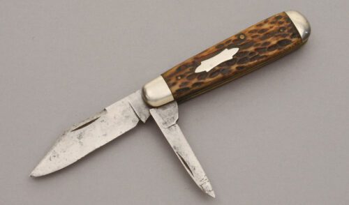 Cattaraugus Cutlery Co. 22349 Two Blade Jack with Jigged Bone Handle Scales handle material - Obverse Side - Item #KLC10965