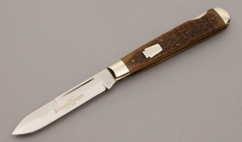 Schatt & Morgan 04111L Jumbo Lockback with Rootbeer Jigged Bone Scales handle material - Obverse Side - Item #KLC11050