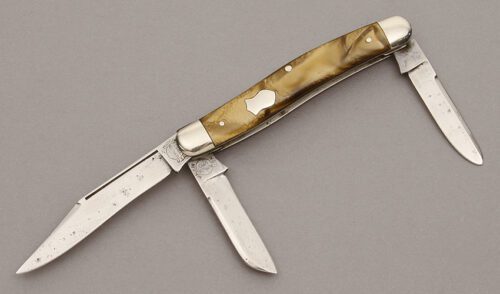 Remington Knives Model 3485 Stockman with Gold Pyremite Scales handle material - Obverse Side - Item #KLC11116