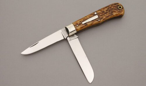 Remington Knives R1123 Bullet Trapper with Brown Jigged Bone Scales handle material - Obverse Side - Item #KLC11119