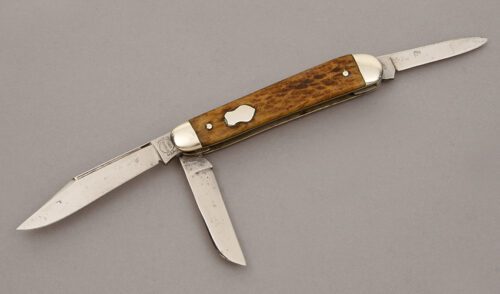 Remington Knives R100A Stock Knife with Brown Jigged Bone Scales handle material - Obverse Side - Item #KLC11184