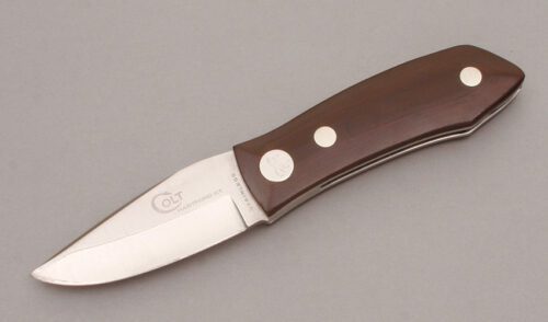 Colt Knives Barry Wood Swing Folder with Maroon Micarta Handle Scales handle material - Obverse Side - Item #KLC11223