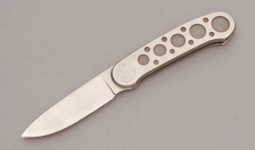 Pacific Cutlery Barry Wood Butterfly Folder with Machined Stainless Steel handle material - Obverse Side - Item #KLC11227
