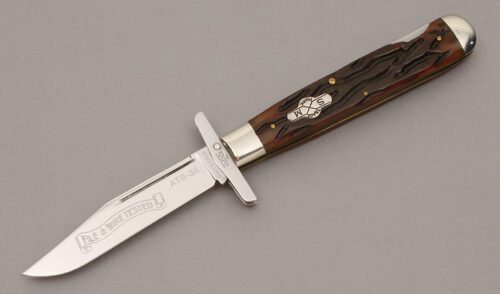 Schatt & Morgan 04111L Swing Guard Lockback with Worm Groove Jigged Bone handle material - Obverse Side - Item #KLC11251