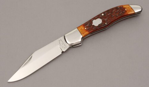 A.G. Russell KCC FH-2 Folding Hunter with Brown Jigged Bone Scales handle material - Obverse Side - Item #KLC11253