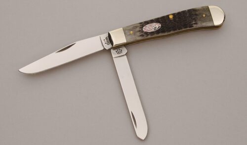 Case Cutlery 6254 Trapper with Pitch Black Jigged Bone Scales handle material - Obverse Side - Item #KLC11309