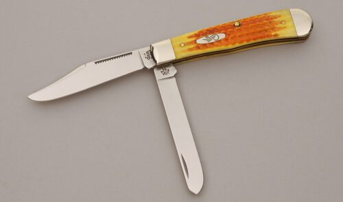 Case Cutlery 6254 Trapper with Yellow & Oranged Jigged Bone handle material - Obverse Side - Item #KLC11310