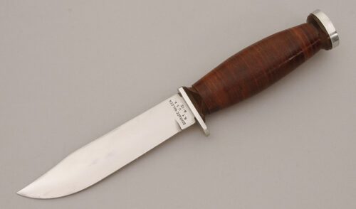 Schrade Cutlery H-15 Hunter with Stacked Leather Handle handle material - Obverse Side - Item #KLC11343