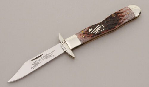 Case Cutlery 6111 1/2L Cheetah Lockback with Cranberry Jigged Bone Scales handle material - Obverse Side - Item #KLC11484