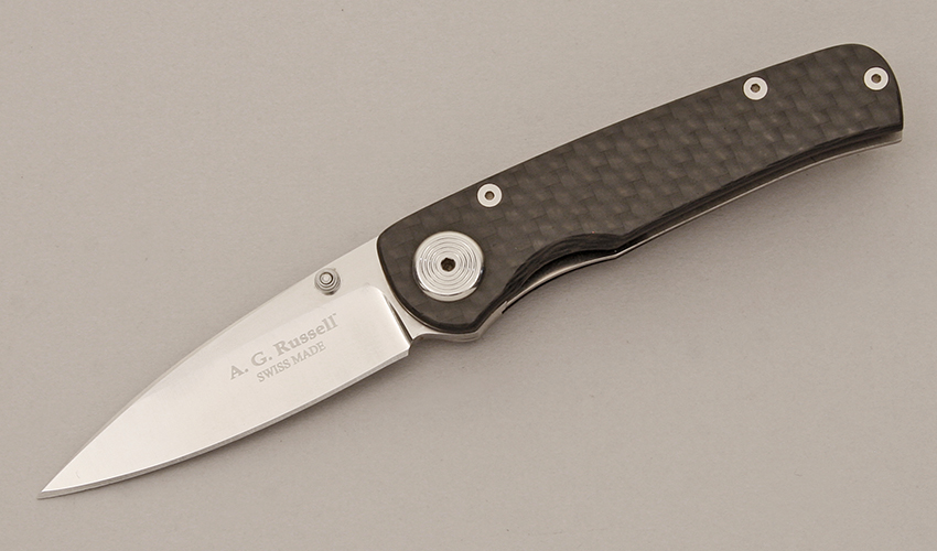 A.G. Russell Linerlock Folder with Polished Carbon Fiber Frame handle material - Obverse Side - Item #KLC11562